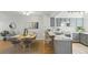 Bright kitchen with stainless appliances, gray cabinets, and an eat in counter at 1699 S Trenton St # 147, Denver, CO 80231