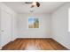 Bedroom featuring laminate wood flooring and a window providing ample natural light at 1334 Carriage Dr, Longmont, CO 80501