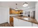 Well lit kitchen featuring stainless steel appliances and eat-in breakfast bar, perfect for entertaining at 1334 Carriage Dr, Longmont, CO 80501