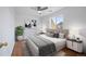 Well-appointed main bedroom featuring laminate wood flooring, neutral decor, and plenty of natural light at 1334 Carriage Dr, Longmont, CO 80501