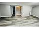 Basement with new hardwood floors and repainted walls at 4901 Bryant St, Denver, CO 80221