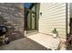 Cozy back patio featuring brick accents, sliding glass doors, and space for outdoor décor at 10842 W Evans Ave # 34, Lakewood, CO 80227