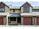 Charming townhouse with a well-maintained exterior and attached garage, located at number 34 at 10842 W Evans Ave # 34, Lakewood, CO 80227