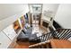 Open-concept living room showcasing a fireplace, modern furnishings, and plenty of natural light at 10842 W Evans Ave # 34, Lakewood, CO 80227