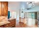 Open concept kitchen with granite countertops, stainless appliances, and views into the living room at 9655 E Center Ave # 11D, Denver, CO 80247