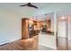 Modern kitchen featuring stainless steel appliances, wood cabinets, and granite countertops at 9655 E Center Ave # 11D, Denver, CO 80247