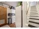 Basement with storage and stairs at 1705 Lewis St, Lakewood, CO 80215