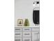 Modern bathroom vanity with white countertops, stylish mirror and black hardware at 108 Arapahoe St, Golden, CO 80403