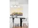 Dining area showcasing contemporary lighting and mountain view art at 108 Arapahoe St, Golden, CO 80403