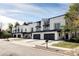 Modern townhomes with clean lines, private garages, and landscaped front yards, located in a desirable neighborhood at 108 Arapahoe St, Golden, CO 80403