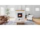 Inviting living room with a modern fireplace, ample natural light, and stylish decor at 108 Arapahoe St, Golden, CO 80403