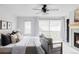Spacious main bedroom boasts natural light, a ceiling fan, and a fireplace at 108 Arapahoe St, Golden, CO 80403