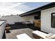 Inviting rooftop deck features comfortable seating, a bar area, and ample space for entertaining and relaxation at 108 Arapahoe St, Golden, CO 80403