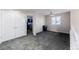 Upstairs bonus room with carpet, ceiling fan, and windows with blinds at 10031 Truckee St, Commerce City, CO 80022