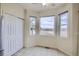 Bright nook with bay window overlooking horse property and tile flooring at 18715 Wagon Trl, Mead, CO 80542