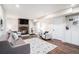 Cozy living room with a fireplace, neutral furnishings and area rug creating a comfortable atmosphere at 18715 Wagon Trl, Mead, CO 80542