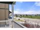 Scenic view from porch overlooking a peaceful neighborhood and the rocky mountains in the distance at 6912 Poudre St, Frederick, CO 80530