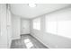 Bright bedroom featuring neutral walls, carpet, and windows providing natural light at 863 S Dudley St, Lakewood, CO 80226