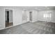 Large bonus room with carpet and recessed lighting, featuring multiple doorways at 863 S Dudley St, Lakewood, CO 80226