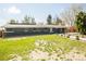 Well-maintained front yard and charming single-story home exterior at 863 S Dudley St, Lakewood, CO 80226