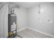 Practical laundry room with modern utilities and ample space at 863 S Dudley St, Lakewood, CO 80226