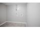 Simple laundry room with tile flooring and utility connections at 863 S Dudley St, Lakewood, CO 80226