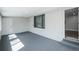Relaxing sunroom with gray carpet, natural light, and a cozy atmosphere at 863 S Dudley St, Lakewood, CO 80226