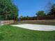 Backyard basketball court and grass at 9451 W Hialeah Pl, Littleton, CO 80123