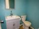 Updated bathroom featuring a stylish vanity, modern fixtures, and neutral color scheme at 9451 W Hialeah Pl, Littleton, CO 80123