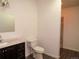 Bathroom featuring a vanity with mirror and neutral decor at 9451 W Hialeah Pl, Littleton, CO 80123