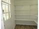 Pantry with adjustable shelving, providing ample and customizable storage space at 9451 W Hialeah Pl, Littleton, CO 80123