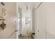 The entry hallway features white walls, carpet, and a closet, leading to the apartment's interior at 655 S Alton Way # 8D, Denver, CO 80247