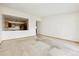 Open living room area featuring an open-concept kitchen at 655 S Alton Way # 8D, Denver, CO 80247
