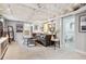 Finished basement with comfortable seating, artwork, and an adjacent bathroom and utility room at 3044 W 40Th Ave, Denver, CO 80211