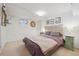Bedroom with carpet and a Queen bed situated between matching end tables at 3044 W 40Th Ave, Denver, CO 80211