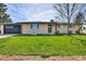 Charming ranch-style home with a well-manicured lawn and inviting curb appeal at 16816 E Costilla Ave, Foxfield, CO 80016
