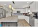 Kitchen with ample storage, stainless steel appliances, granite counters, and a center island with seating at 16816 E Costilla Ave, Foxfield, CO 80016
