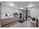 Modern community kitchen featuring stainless appliances, sleek cabinets, and lots of countertop space at 1750 Wewatta St # 1227, Denver, CO 80202