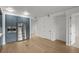 Modern kitchen with stainless steel appliances, custom cabinets and hardwood flooring at 1750 Wewatta St # 1227, Denver, CO 80202