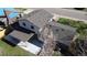 An aerial perspective of the property showing its roof, yard, and patio at 12173 W 68Th Ave, Arvada, CO 80004