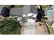 Aerial view showcasing the home's layout, driveway, and landscaping at 12173 W 68Th Ave, Arvada, CO 80004