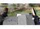 Aerial view of the backyard including a patio area and lawn at 12173 W 68Th Ave, Arvada, CO 80004