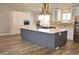Beautiful kitchen with a large island, stainless steel appliances, and ample counter space at 12173 W 68Th Ave, Arvada, CO 80004