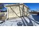 Rear exterior view of the home showing the back yard at 5554 Crystal Way, Denver, CO 80239