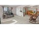 Inviting living room showcasing an open layout, with neutral carpeting and ample natural light at 4546 S Logan St, Englewood, CO 80113