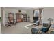 Comfortable living room featuring neutral carpeting, large windows, and traditional furnishings at 4546 S Logan St, Englewood, CO 80113
