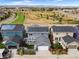 Aerial view showcasing home with solar panels and backyard at 5524 Uinta St, Denver, CO 80238