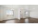 Bright dining room with hardwood floors and large windows at 693 N Tempe St, Aurora, CO 80018