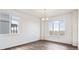 Dining room with hardwood floors and window views at 693 N Tempe St, Aurora, CO 80018