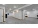 Spacious finished basement featuring neutral carpet, recessed lighting, and flexible layout at 2539 Lake Meadow Dr, Lafayette, CO 80026